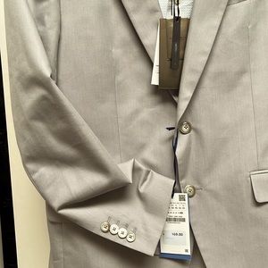 Jacket never worn. Handsome grey with handkerchief. Cute. Zara made. Size on tag